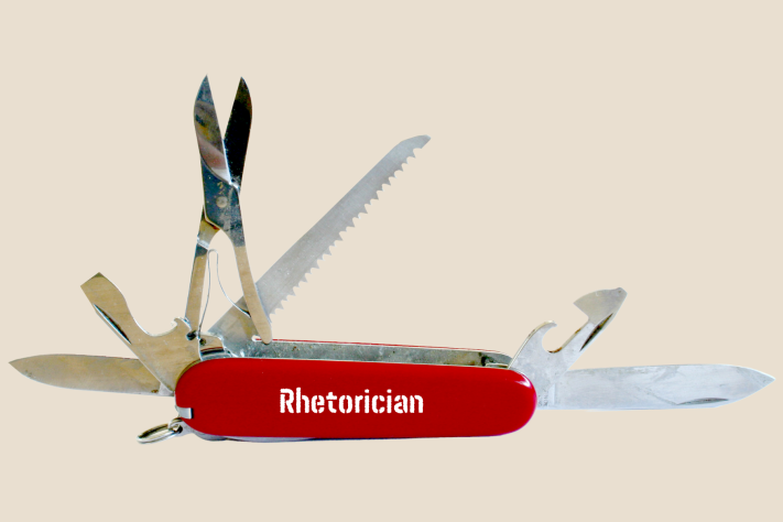 Open Swiss Army knife with "Rhetorician" stamped (in white) on its red body.
